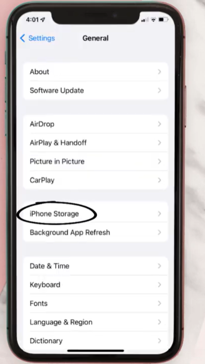 Select iPhone Storage: In the General settings, tap on "iPhone Storage."